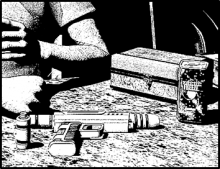 Razgar Sonat's Desk including a box, gun, and drink can